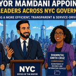 Cartoon illustration of NYC Mayor Mamdani announcing new government appointments including Paul Ochoa, Shawn Smith-Cruz, and Annie Levers in 2026
